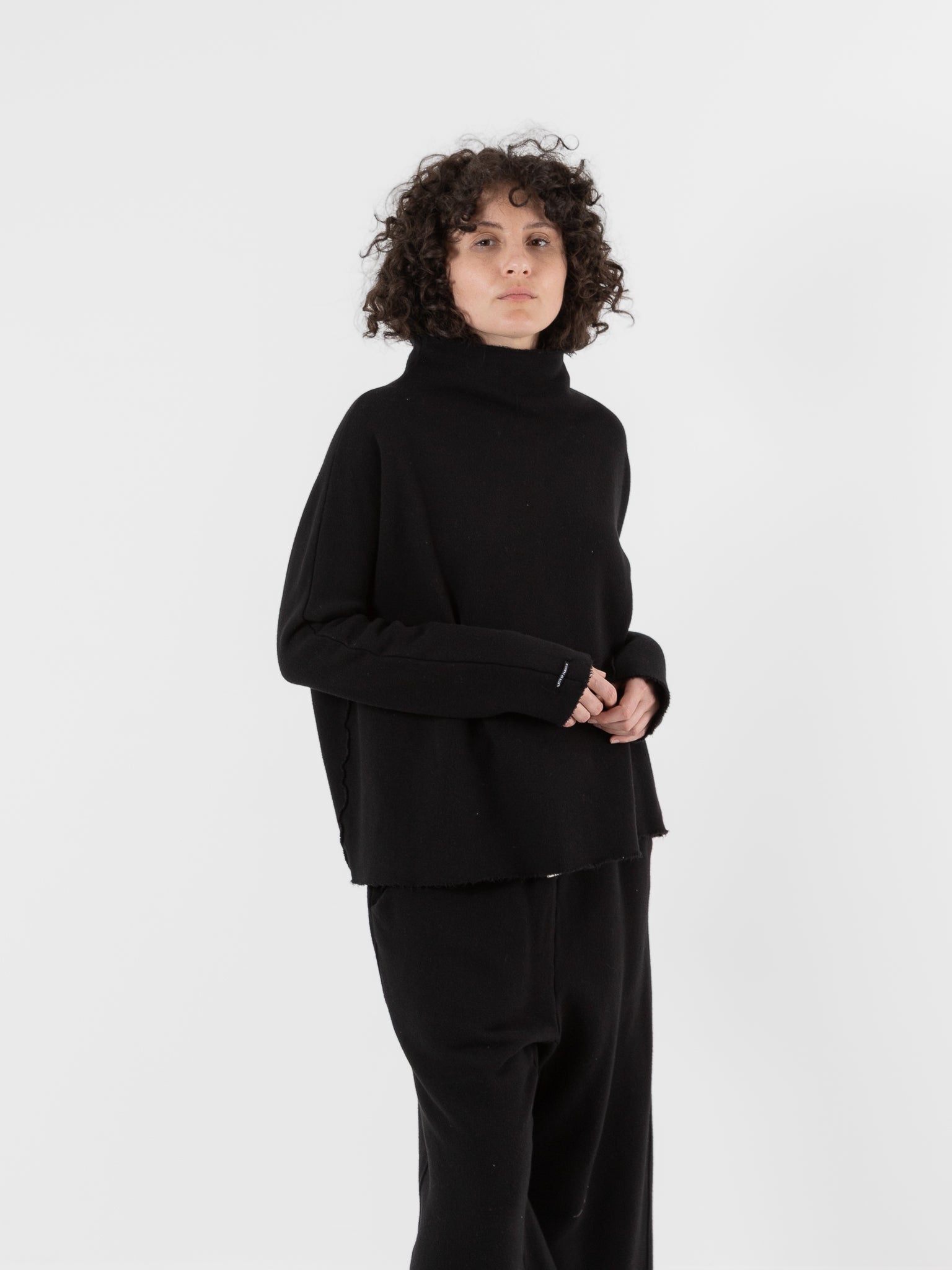 Album di Famiglia Soft High Neck Pullover in Black - ALBUM DI FAMIGLIA at Worthwhile - shop TOP