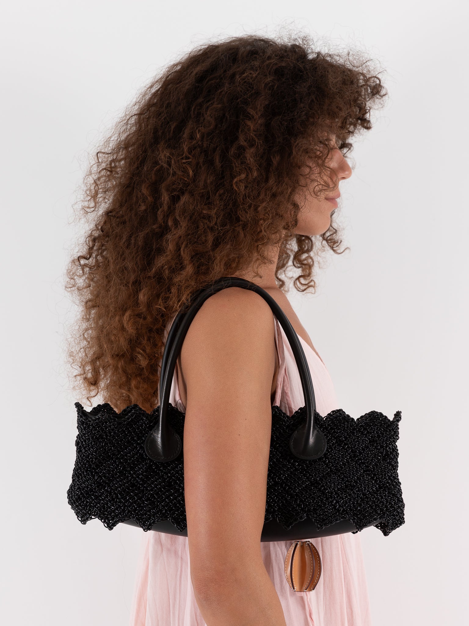 The Backward Vendor Weaver Pouch in Black - THE BACKWARD VENDOR at Worthwhile - shop BAG