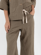 Der Antagonist Trouser in Moss Green - DER ANTAGONIST at Worthwhile - shop JACKET