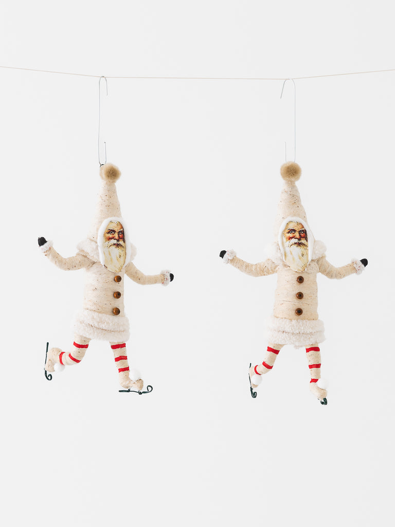 Spun Cotton Ice Skating Santa Ornament in White - Worthwhile