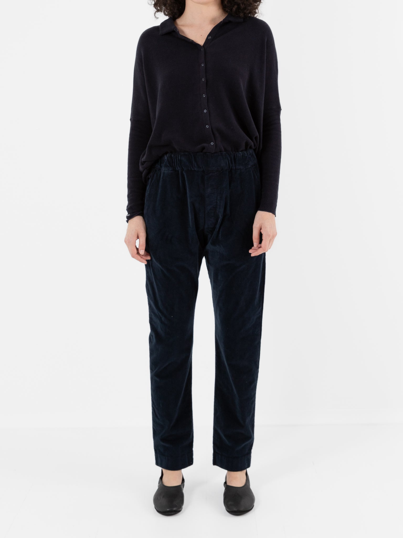 Album Di Famiglia Velvet Slim Trousers in Ink at Worthwhile