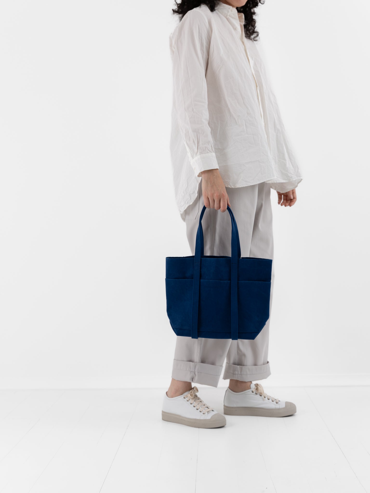 Amiacalva 6 Pocket Small Tote in Blue at Worthwhile