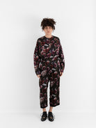 École De Curiosités Pierre Reversible Pant in Black/Roses - ECOLE DE CURIOSITES at Worthwhile
