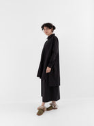 The Backward Vendor Drift Overshirt in Black - THE BACKWARD VENDOR at Worthwhile - shop TOP